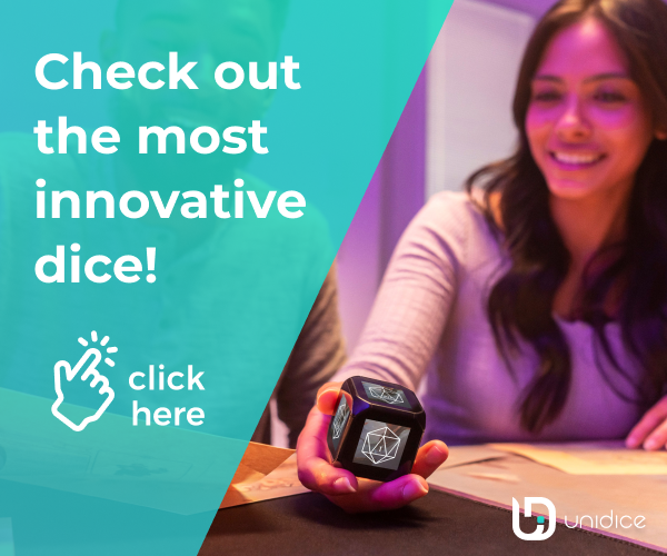 smiling girl holding the unidice in her hand.