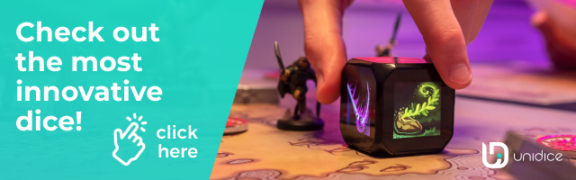 hand playing with unidice on a boardgame